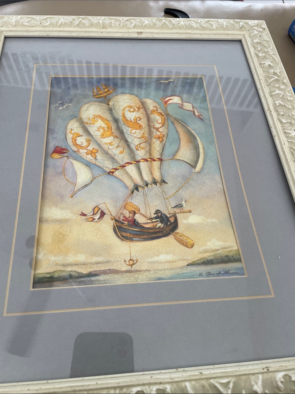 Framed Nautical Balloon Art Print in Blue and Gold by Alexandra Churchill.
